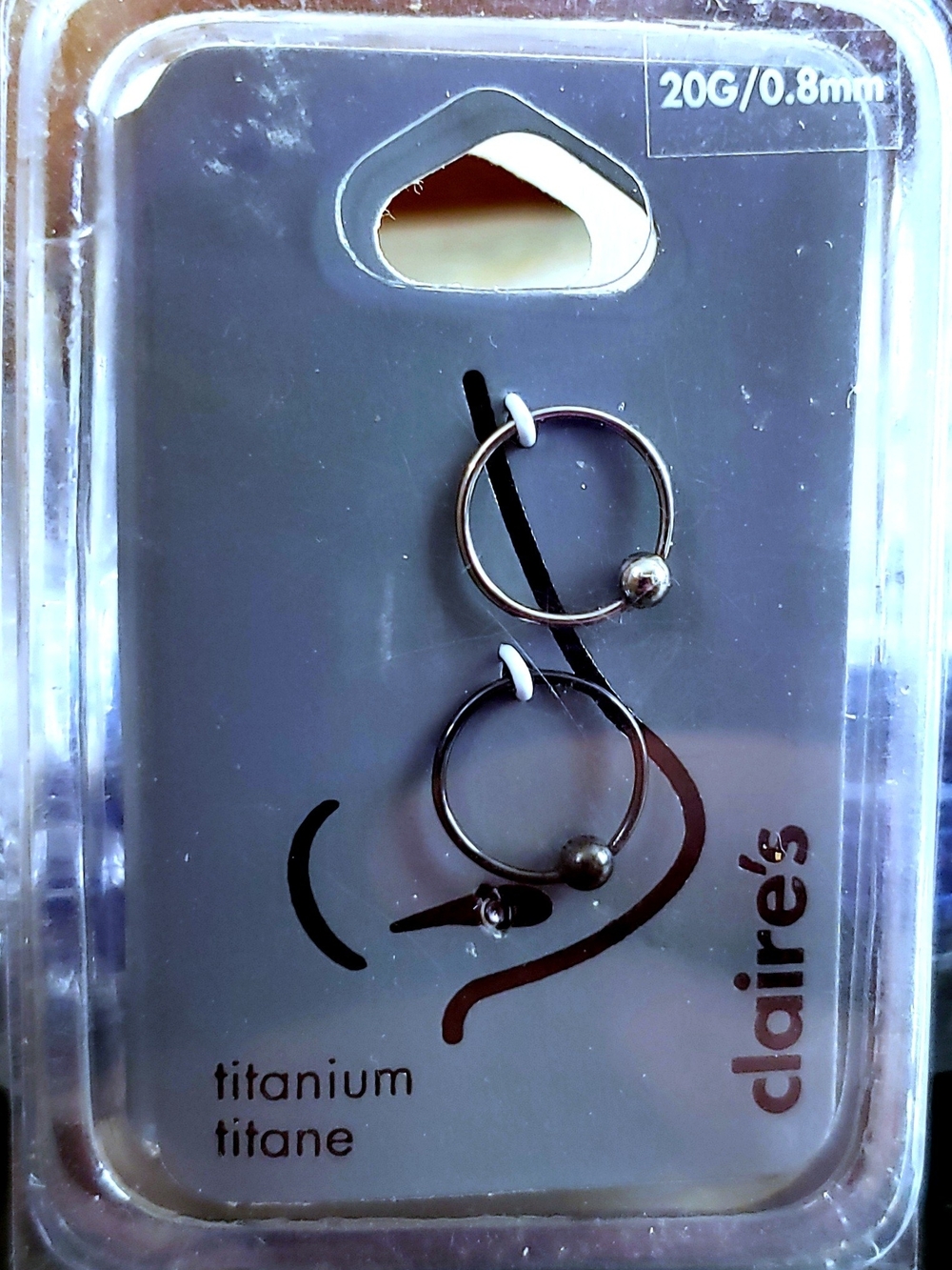 Claire's 2 Piece Black And Silver Titanium Hoop Nose Rings - 20G/0.8mm
